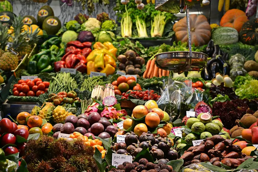 A market stall overflowing with fresh fruit and vegetables